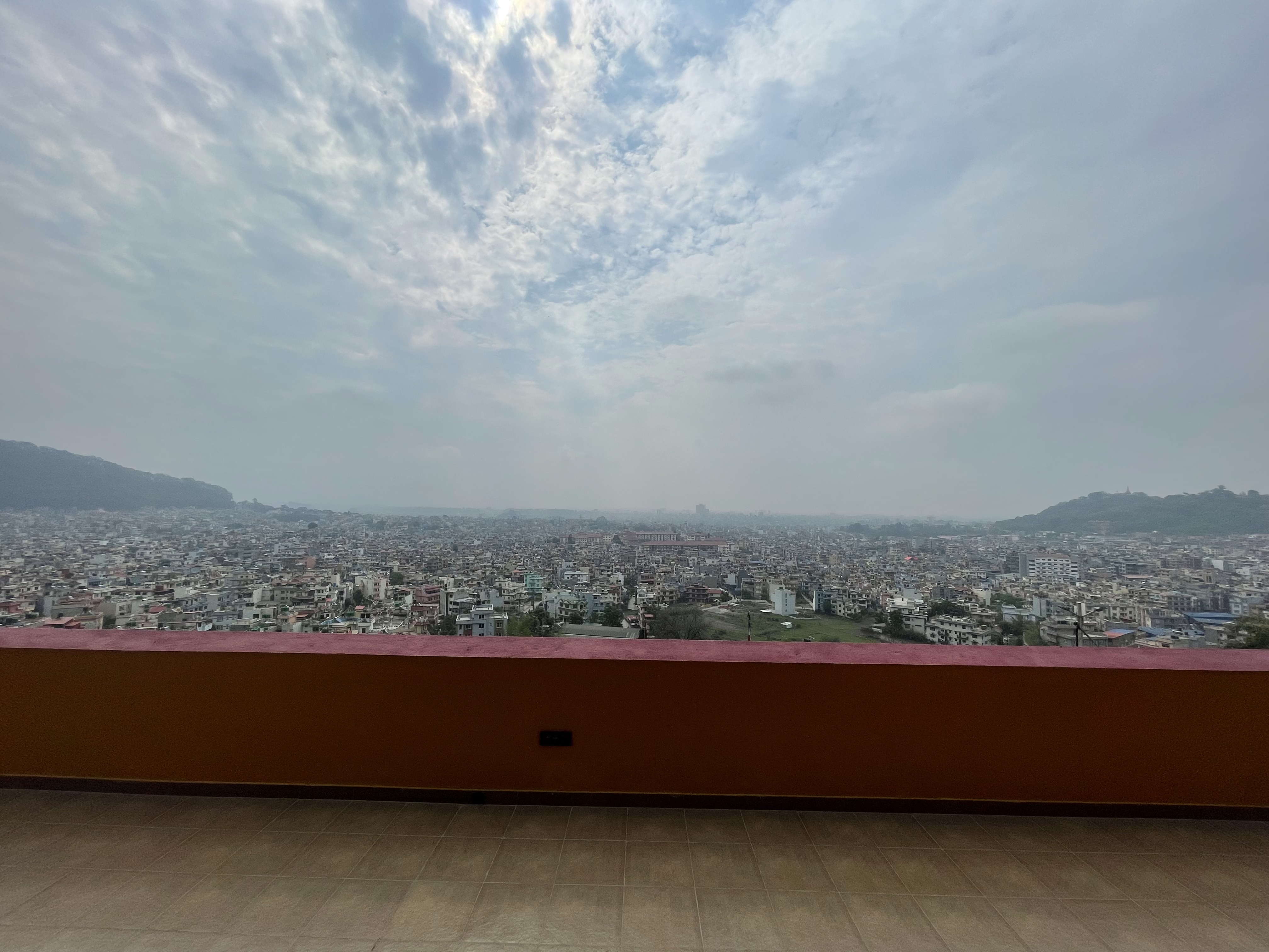 The Kathmandu Valley seen from the monastery courtyard